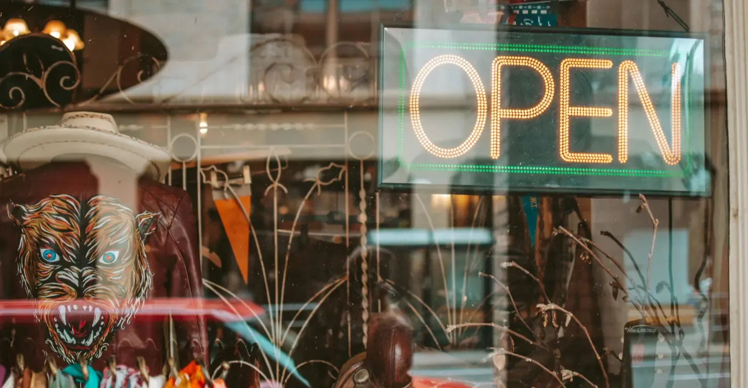 Thrift store interior with clothing racks